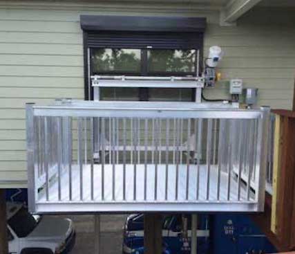 Galaxy Voyager HD cargo lift on a light-green residential home